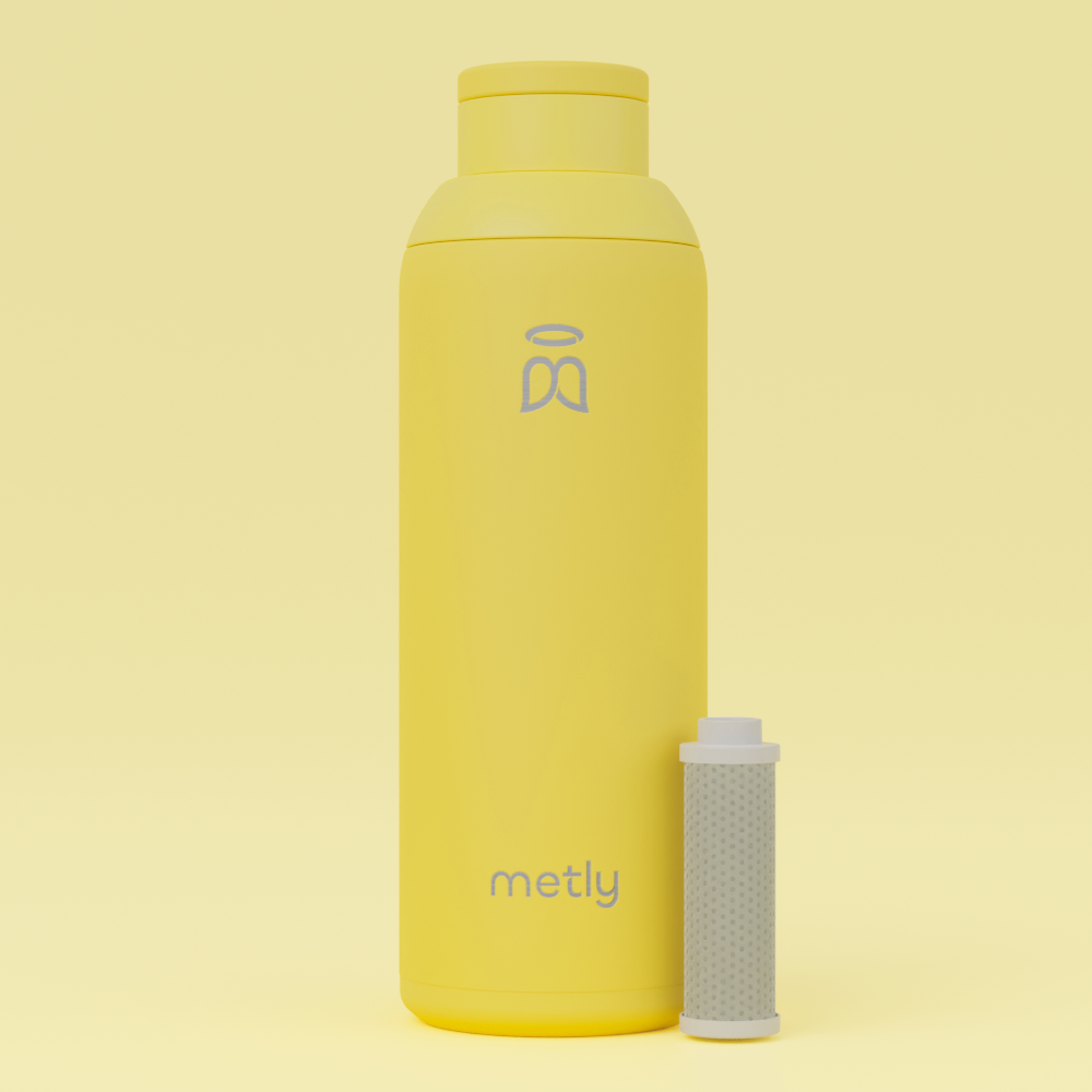 Metly Custard 500ml filtered water bottle in vibrant yellow with visible carbon filter, crafted from high-grade recycled stainless steel, BPA-free